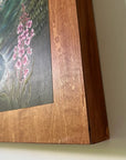 a close-up of the wooden frame holding a final switchback original painting by artist Katie Jeanne Ream