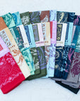 all of the final switchback cotton bandanas laid out in packages featuring artist Katie Jeanne Reim's prints