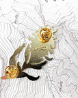 the back of the final switchback alpine lupine enamel pin created by artist Katie Jeanne Reim