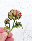 final switchback poppy enamel pin created by artist Katie Jeanne Reim