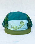 front view of the final switchback 5-panel trail hat featuring artist Katie Jeanne Reim's Fern print