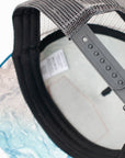 brim view of the final switchback trucker hat featuring artist Katie Jeanne Reim's Glacier Goat Summit print
