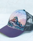 angle view of the final switchback trucker hat featuring artist Katie Jeanne Reim's Glacier Two Medicine print