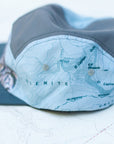 left side view of the final switchback 5-panel trail hat featuring artist Katie Jeanne Reim's half-dome print