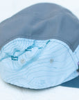 side view of the final switchback 5-panel trail hat featuring artist Katie Jeanne Reim's half-dome print