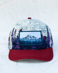 front view of the final switchback twill hat featuring artist Katie Jeanne Reim's Mount Rainier Meadow print