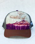front view of the final switchback trucker hat featuring artist Katie Jeanne Reim's Mount Rainier Sunset print
