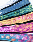 a variety of final switchback headbands printed with Katie's nature art prints