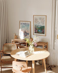 frames with final switchback by artist Katie Jeanne Ream prints on the wall in an office