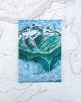 a final switchback button magnet featuring Katie Jeanne Reim's hood falls print