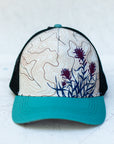 front view of the final switchback trucker hat featuring artist Katie Jeanne Reim's paintbrush print