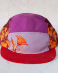 front view of the final switchback 5-panel trail hat featuring artist Katie Jeanne Reim's Poppy print