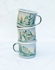 Three stacked final switchback fireproof enamel mugs featuring artist Katie Jeanne Reim's Yosemeite National Park print