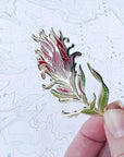 final switchback red paintbrush enamel pin created by artist Katie Jeanne Reim