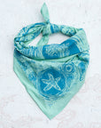 final switchback cotton bandana in Tidepool Shallow featuring artist Katie Jeanne Reim's prints