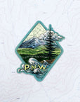 final switchback vinyl waterproof sticker featuring Katie Jeanne Reim's PNW print