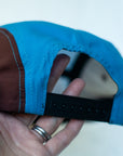 back view of the final switchback 5-panel trail hat featuring artist Katie Jeanne Reim's Zion print