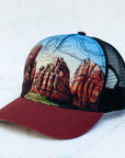 side view of the final switchback trucker hat featuring artist Katie Jeanne Reim's Zion print