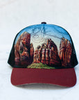 front view of the final switchback trucker hat featuring artist Katie Jeanne Reim's Zion print