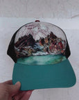 broken top trucker hat by final switchback featuring Katie Reim's art video