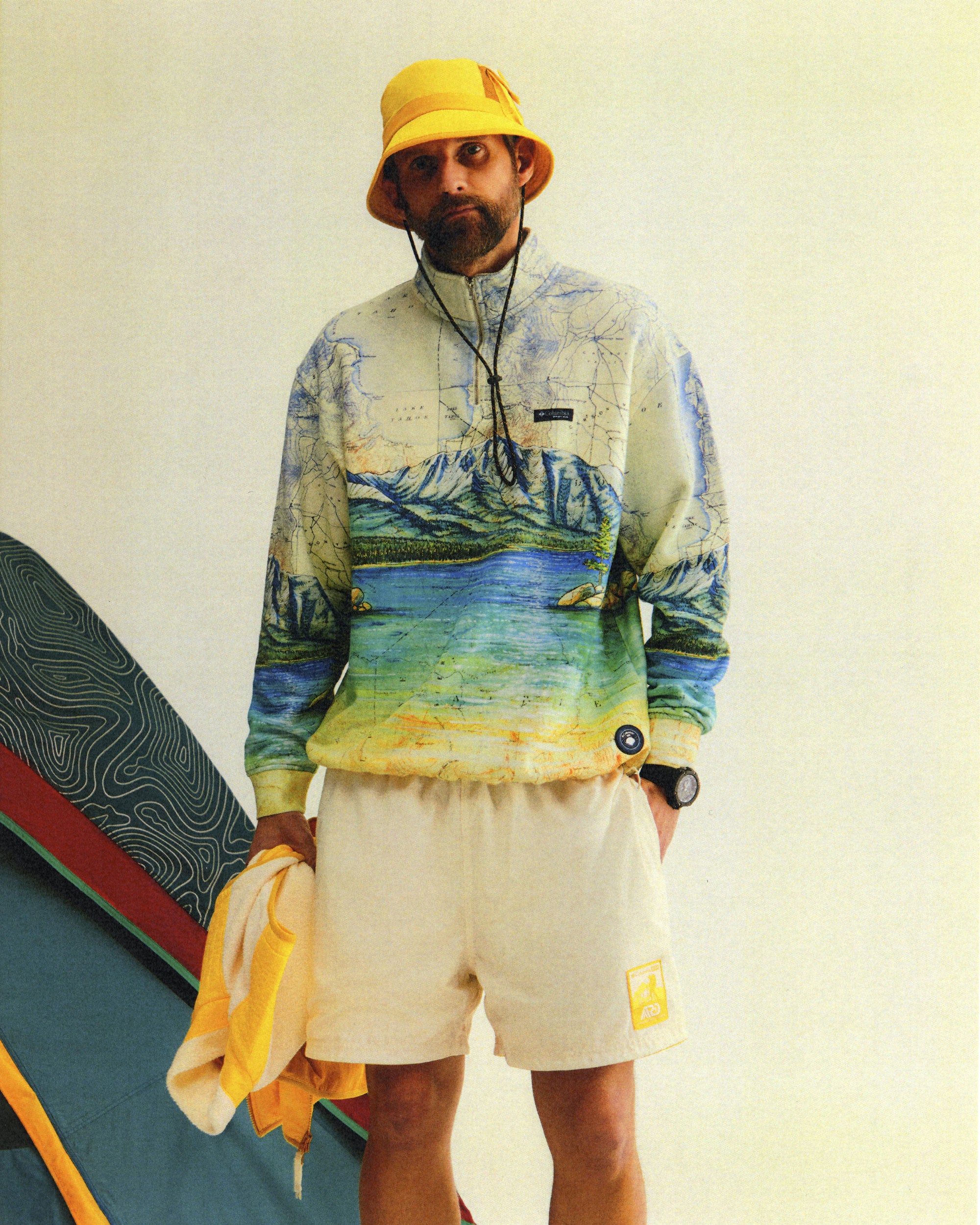 Model wearing printed clothes with a final switchback print for a custom commission project for Kith x Columbia