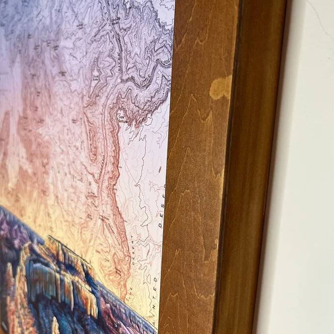a close-up of the wooden frame holding a final switchback original painting by artist Katie Jeanne Ream