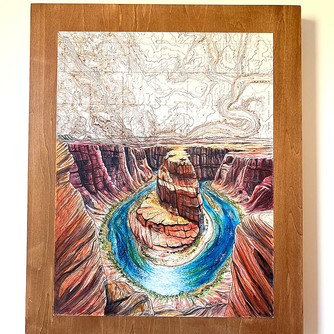 a close-up of the horseshoe bend final switchback original painting in a wooden frame by artist Katie Jeanne Ream