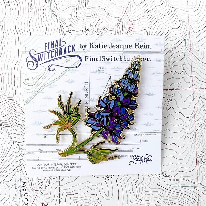 final switchback alpine lupine enamel pin with holder created by artist Katie Jeanne Reim