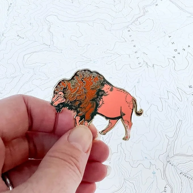 final switchback Bison enamel pin created by artist Katie Jeanne Reim