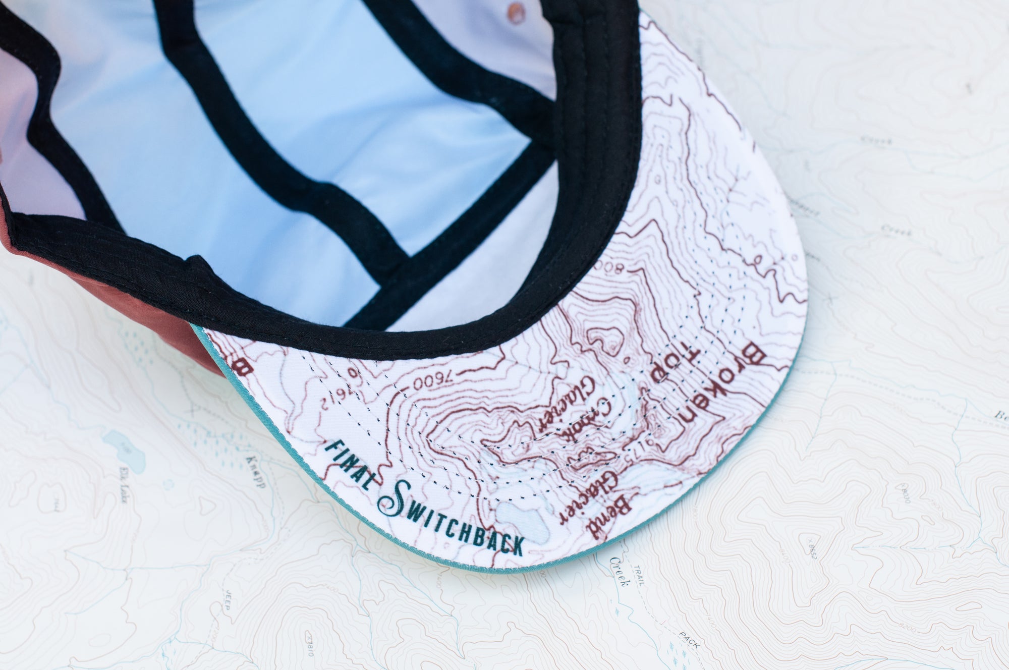 brim view of the final switchback 5-panel trail hat featuring artist Katie Jeanne Reim&#39;s half-dome print