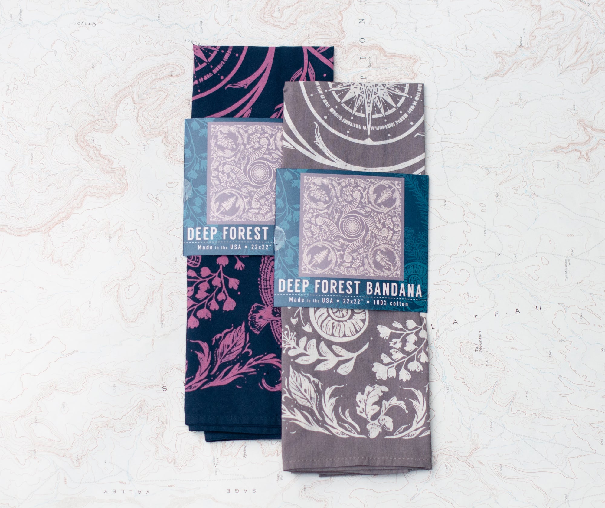 two final switchback cotton bandanas in Deep Forest wildberry and stone featuring artist Katie Jeanne Reim&#39;s prints