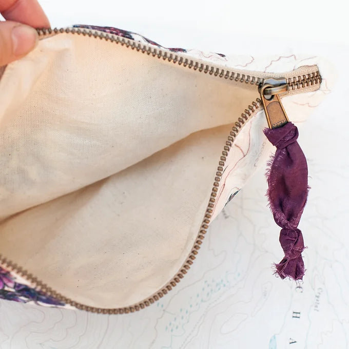 interior view of a final switchback eco-friendly recycled zip pouch featuring artist Katie Jeanne Reim's print