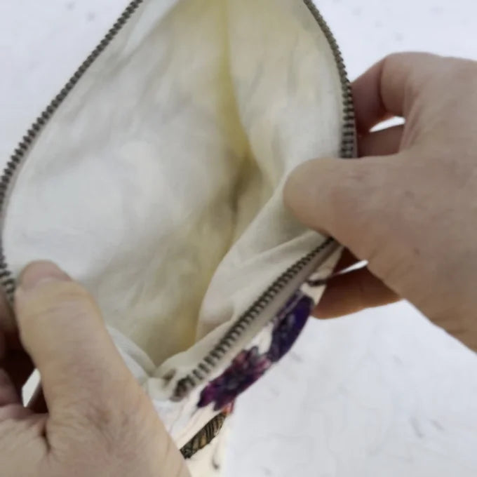 interior view of a final switchback eco-friendly recycled zip pouch featuring artist Katie Jeanne Reim&#39;s print