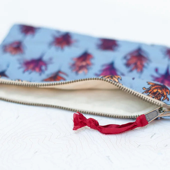 interior view of a final switchback eco-friendly recycled zip pouch featuring artist Katie Jeanne Reim's Paintbrush print