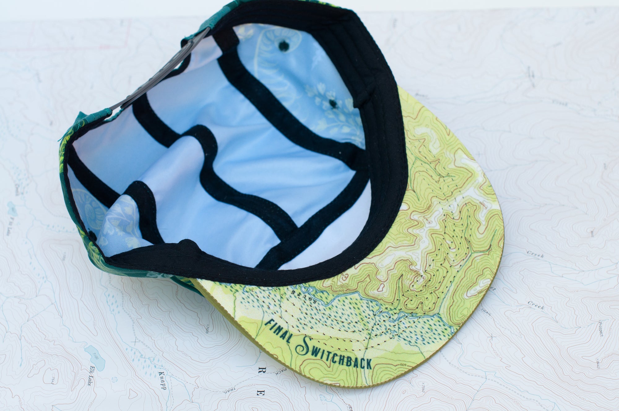 brim view of the final switchback 5-panel trail hat featuring artist Katie Jeanne Reim's Fern print