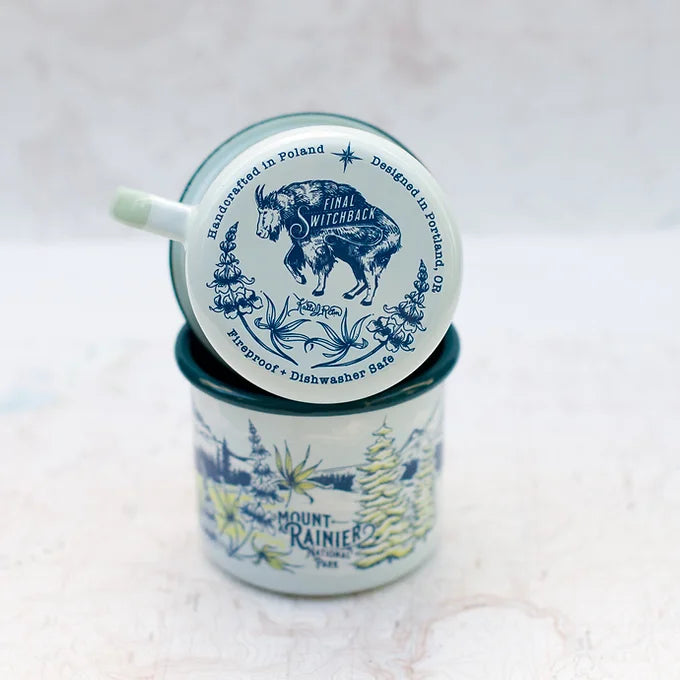The bottom of a final switchback fireproof enamel mug featuring artist Katie Jeanne Reim's Mount Rainier print