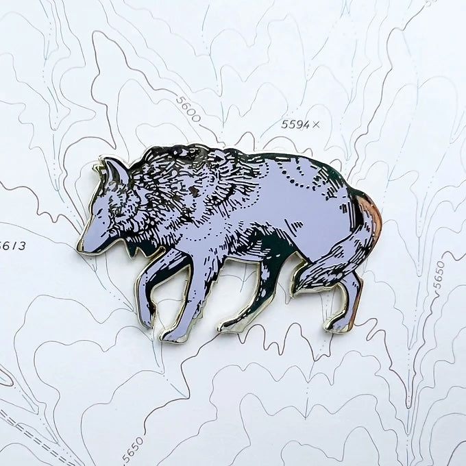 final switchback grey wolf enamel pin created by artist Katie Jeanne Reim