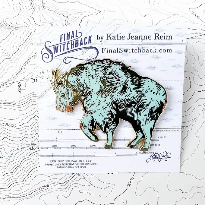 final switchback mountain goat enamel pin on holder created by artist Katie Jeanne Reim