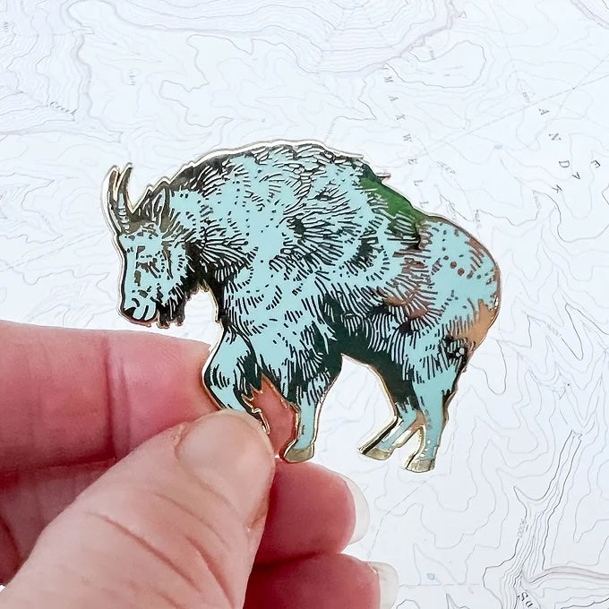 final switchback mountain goat enamel pin created by artist Katie Jeanne Reim