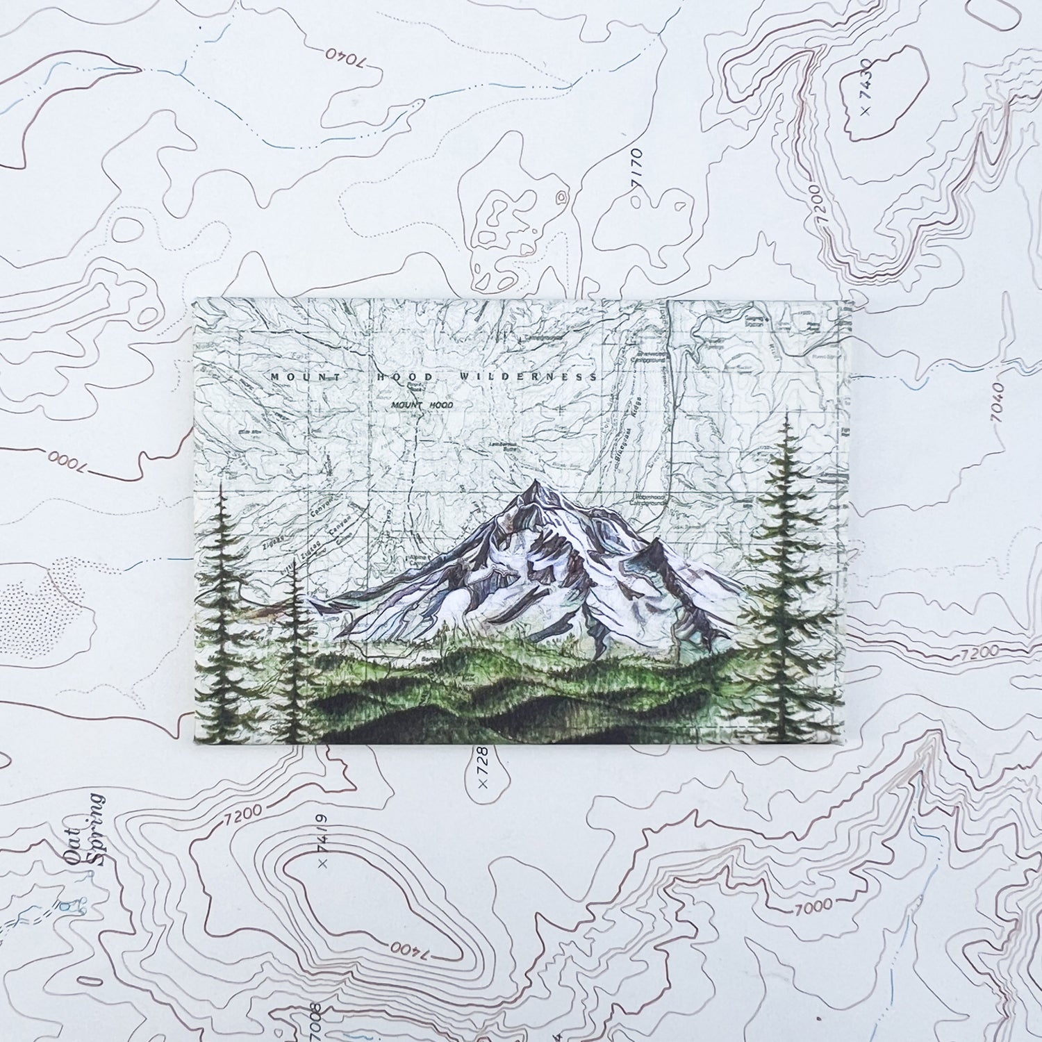 a final switchback button magnet featuring Katie Jeanne Reim's mount hood winderness print