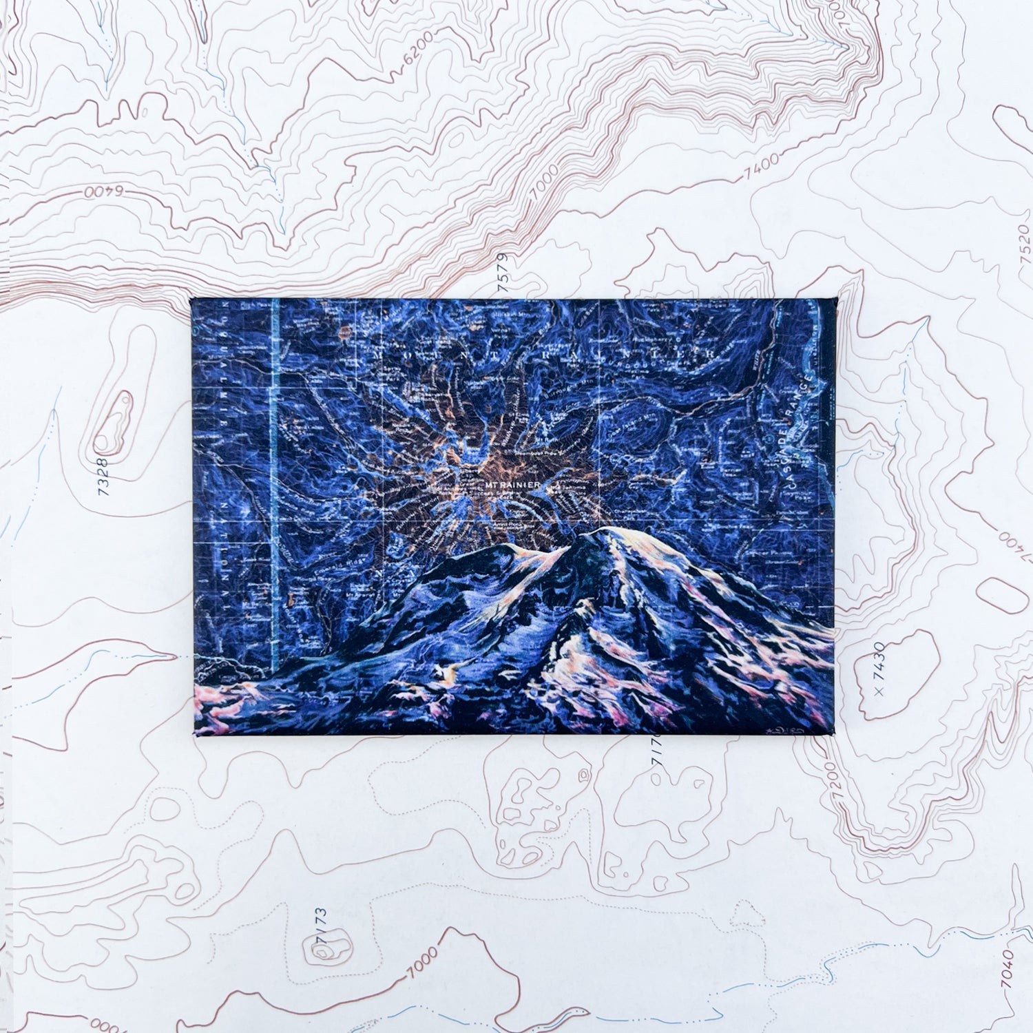 a final switchback button magnet featuring Katie Jeanne Reim's mount rainier night print