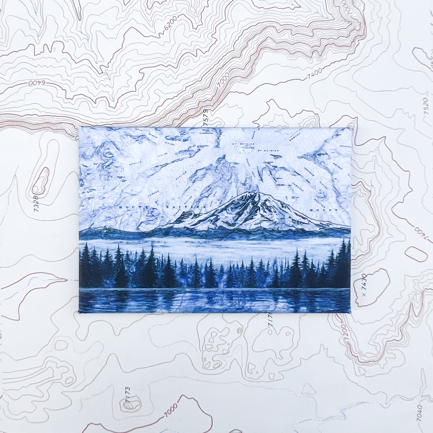 a final switchback button magnet featuring Katie Jeanne Reim's mount rainier morning print