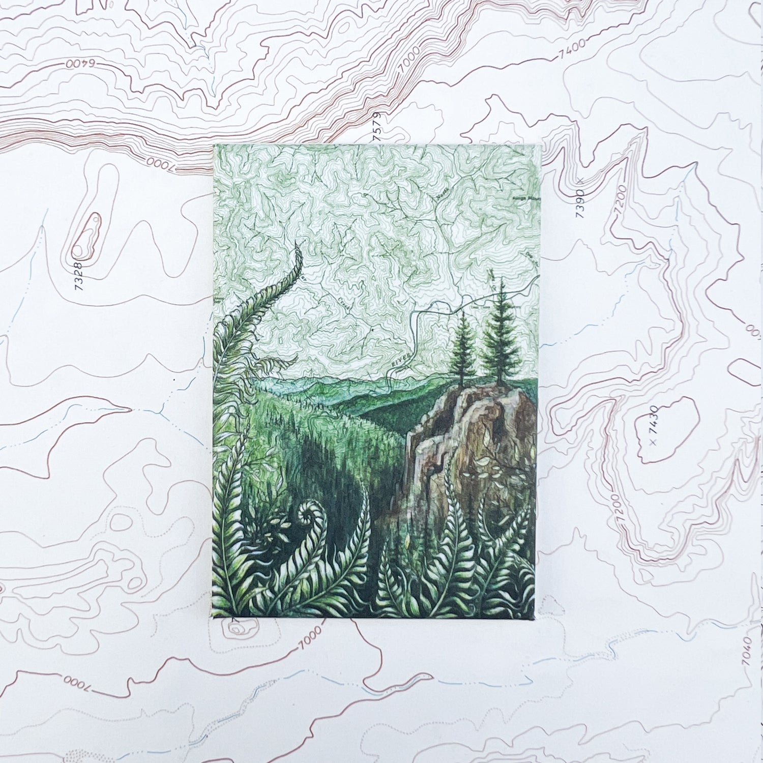 a final switchback button magnet featuring Katie Jeanne Reim's tillamook print