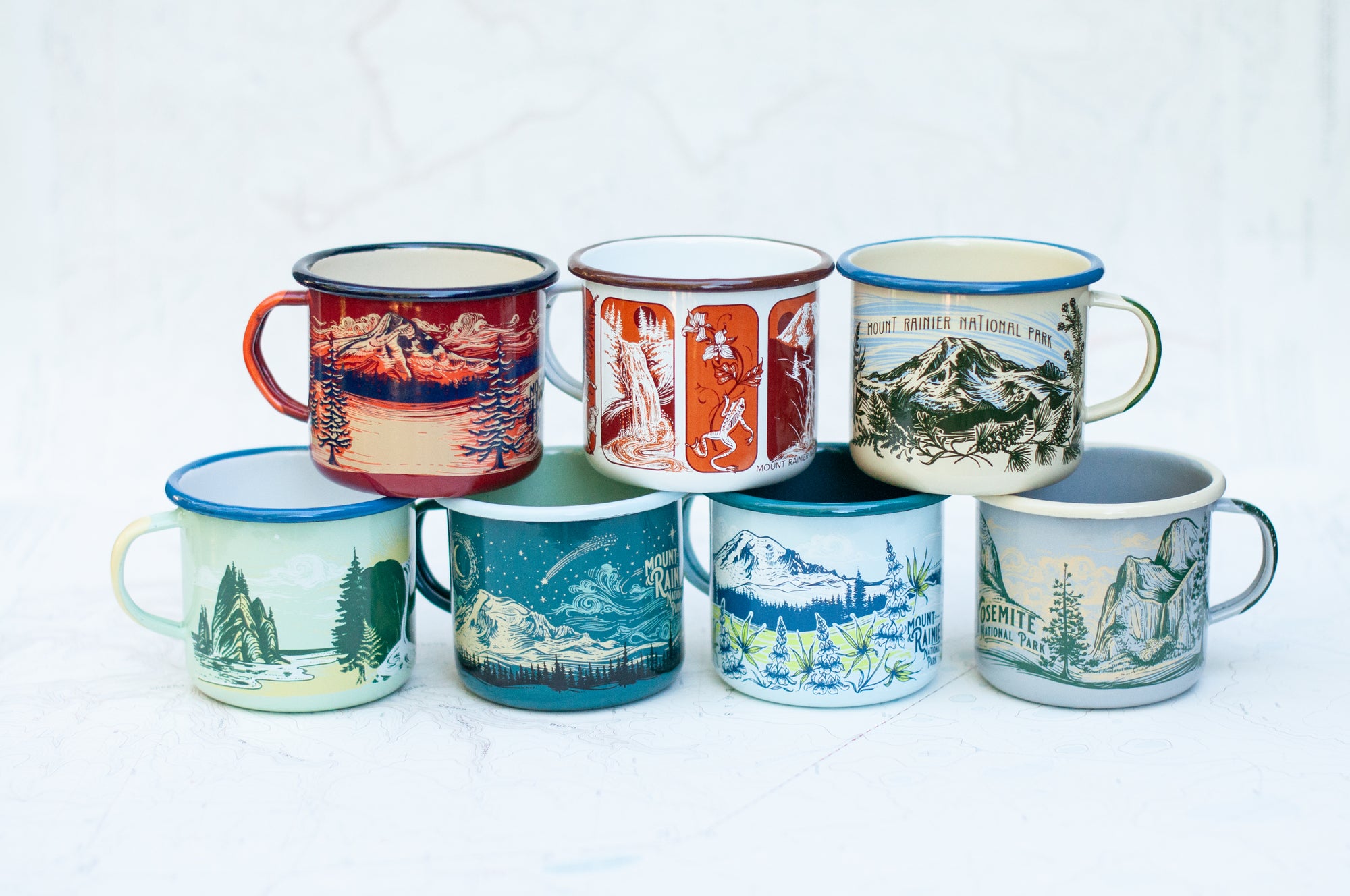 final switchback collection of enamel mugs featuring Katie Jeanne Reim's acrylic and ink prints