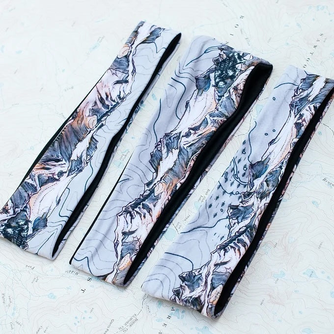 3 final switchback quick dry headbands featuring artist Katie Jeanne Reim's Ridgeline print