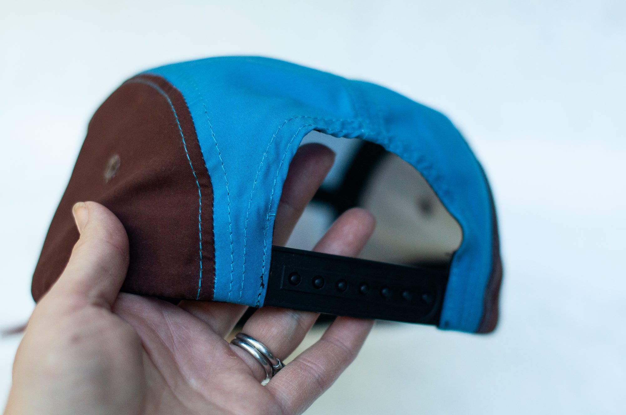back view of the final switchback 5-panel trail hat featuring artist Katie Jeanne Reim&#39;s Zion print