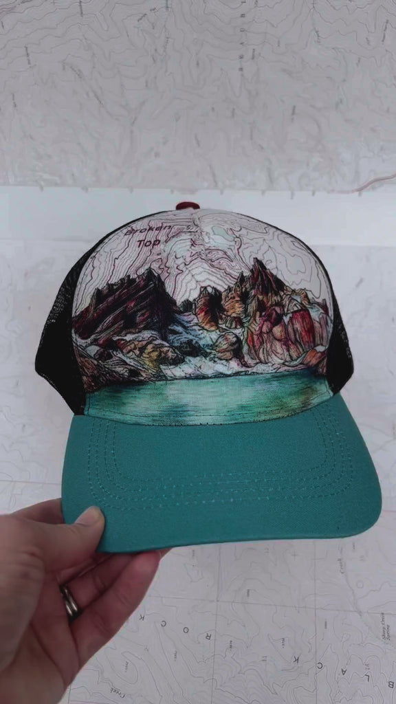 broken top trucker hat by final switchback featuring Katie Reim's art video